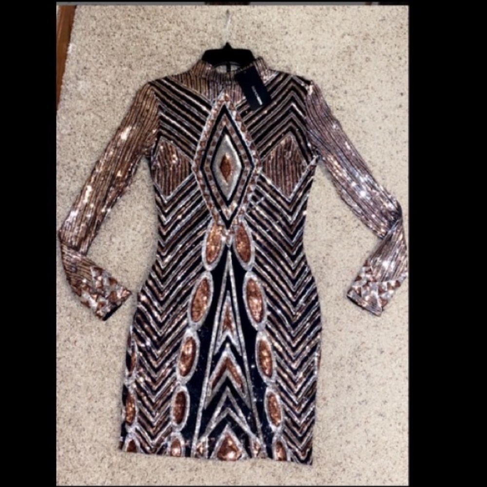 “Everything paid for sequin dress”